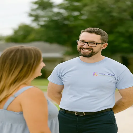 technicians with a customer Second Opinion Electric Tampa Bay electrician consulting with homeowner Second Opinion Electric